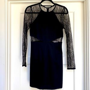LBD with lace sleeves and cutouts.  Upper back is full lace